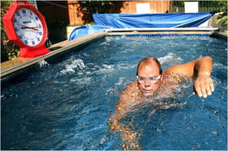 open water swimmer Scott Richards using his backyard Endless Pool to train for his English Channel swim